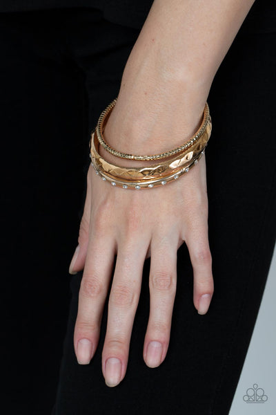 Paparazzi Bracelets - Confidently Curvaceous - Gold